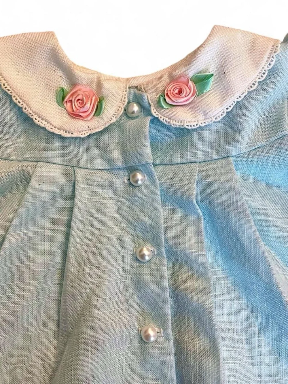 Handmade Baby blue baby dress with white lace collar and pink rose appliqués